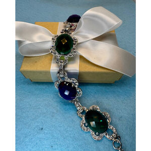 33 grams of Sterling Silver 8” bracelet with Created Gems
